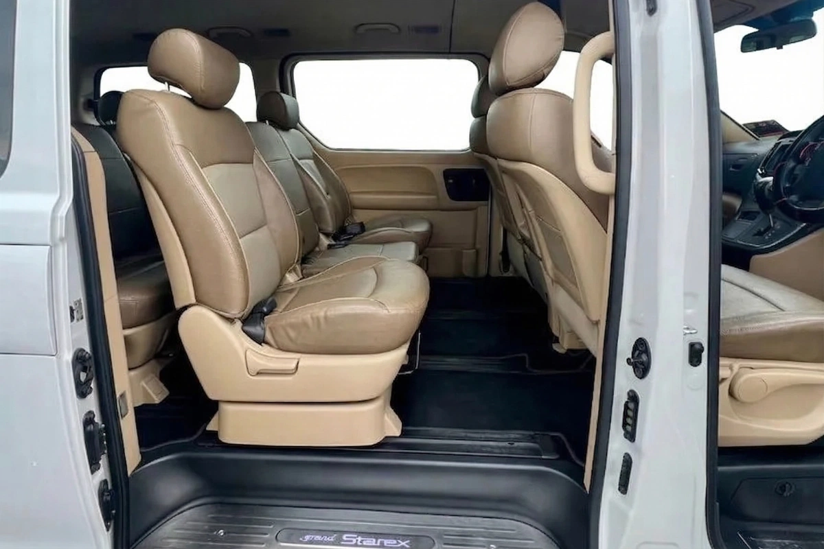 Comfortable interior space and legroom of Hyundai Starex 11 seater private transport SG to JB
