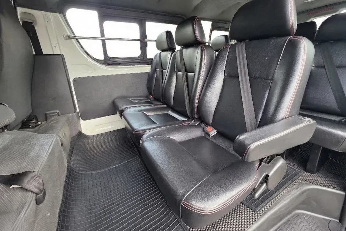 Front cabin view of 11 seater private van for SG to JB transfer