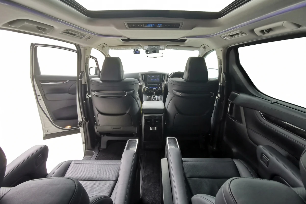 Generous passenger legroom in Toyota Alphard 7 seater private transport to Malaysia